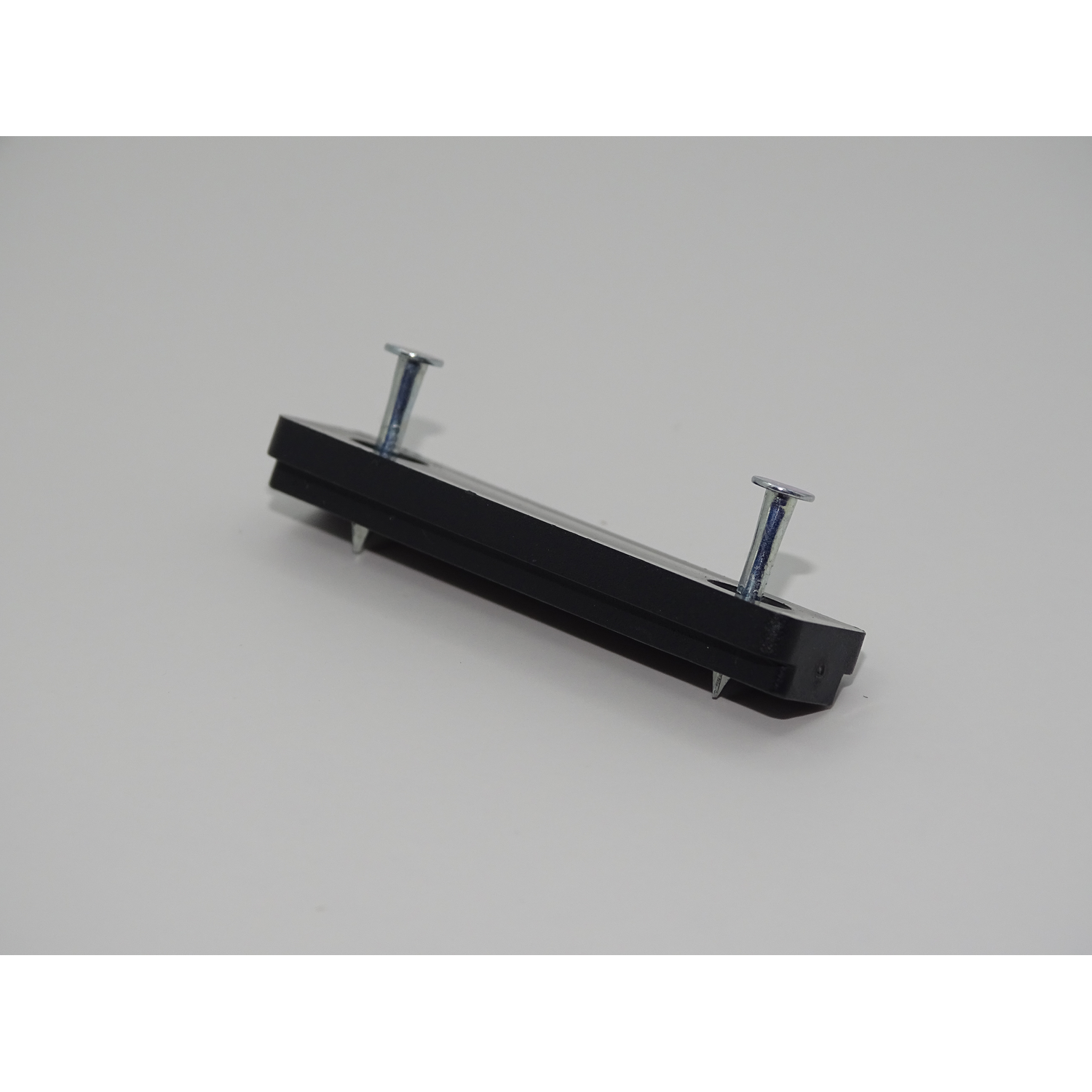 Houder voor plintclip te nagelen